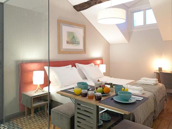 Santa Catarina FLH Suites : photo 2 de la chambre chambre lits jumeaux