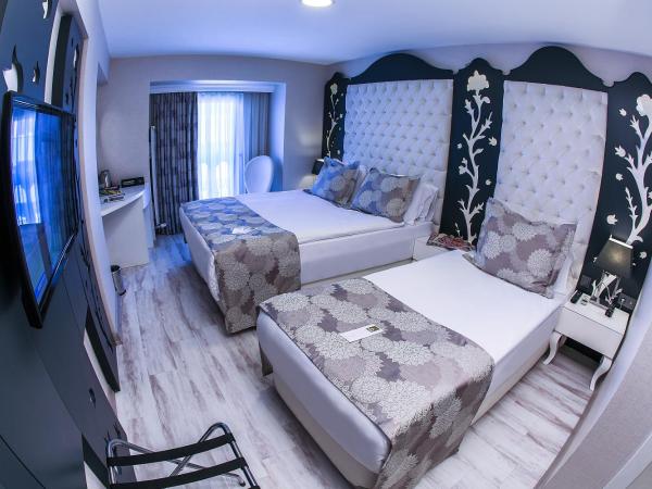 Demonti Hotel : photo 7 de la chambre chambre triple confort