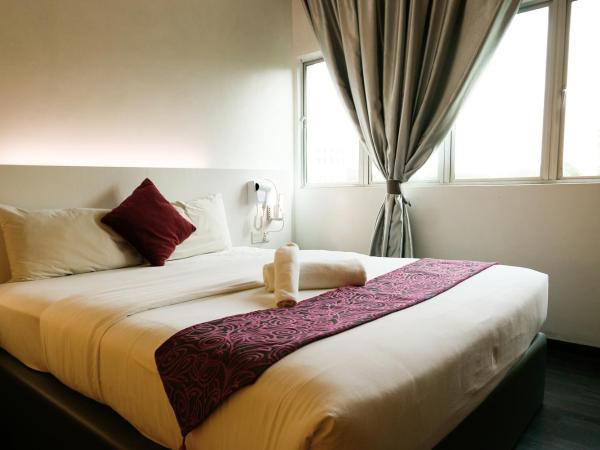 Golden Roof Hotel Ampang Ipoh : photo 1 de la chambre chambre standard lit queen-size