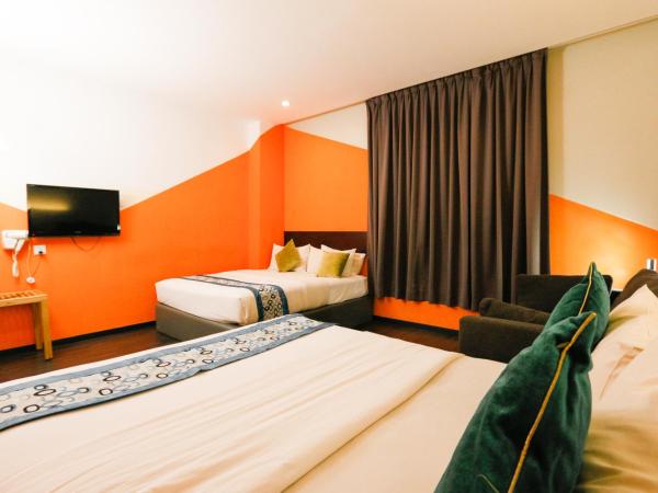 Golden Roof Hotel Ampang Ipoh : photo 2 de la chambre chambre avec 2 grands lits queen-size 