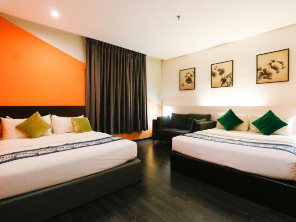 Golden Roof Hotel Ampang Ipoh : photo 1 de la chambre chambre avec 2 grands lits queen-size 