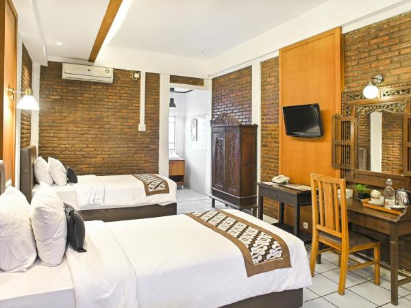 Paku Mas Hotel : photo 2 de la chambre chambre lits jumeaux deluxe