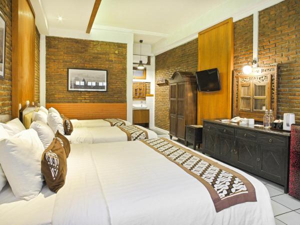 Paku Mas Hotel : photo 3 de la chambre chambre familiale deluxe