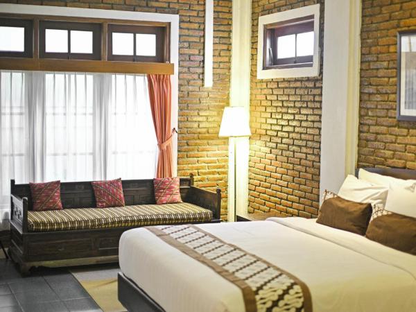 Paku Mas Hotel : photo 1 de la chambre chambre familiale deluxe