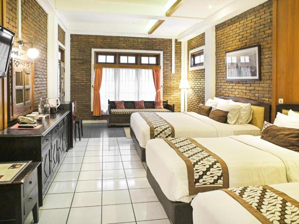 Paku Mas Hotel : photo 2 de la chambre chambre familiale deluxe