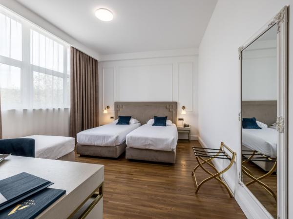 Art Hotel : photo 5 de la chambre chambre triple