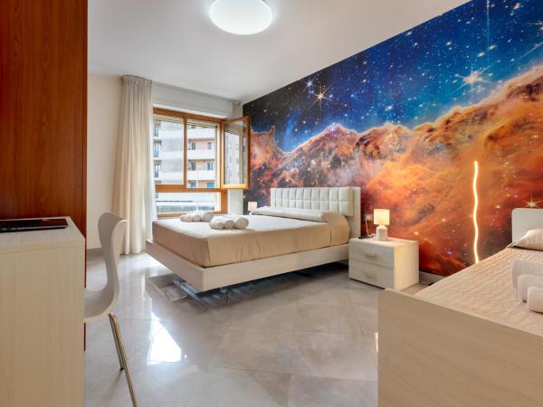 Galaxy Room Sardinia : photo 1 de la chambre chambre triple deluxe