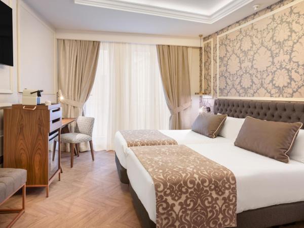 Catalonia Las Cortes : photo 1 de la chambre chambre double ou lits jumeaux