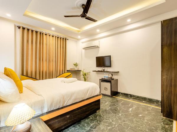 Lime Tree Hotel Huda City Centre : photo 9 de la chambre chambre lit king-size supérieure