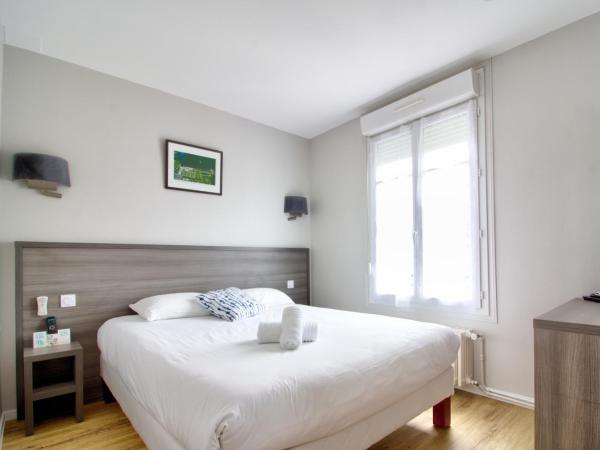 Logis Hôtel Des Châteaux De La Loire : photo 1 de la chambre chambre quadruple confort