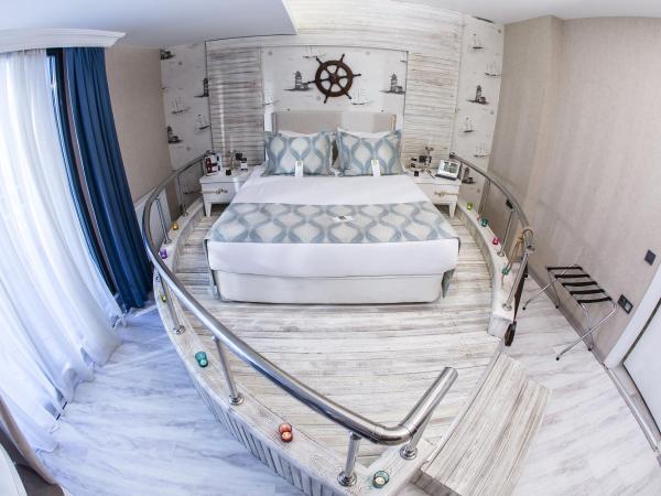 Demonti Hotel : photo 5 de la chambre suite lit queen-size