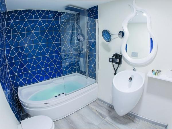 Demonti Hotel : photo 1 de la chambre suite lit queen-size