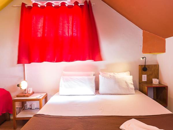 Mambembe Hostel : photo 2 de la chambre chambre double ou lits jumeaux - vue sur ville