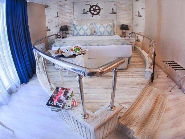 Demonti Hotel : photo 4 de la chambre suite lit queen-size