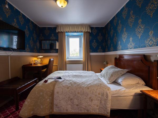 Milling Hotel Plaza : photo 2 de la chambre petite chambre double
