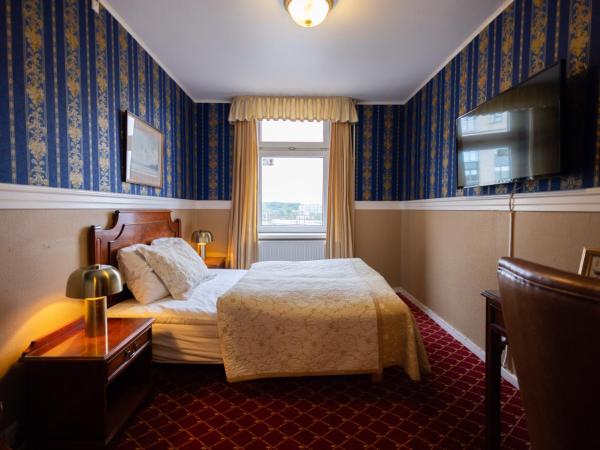 Milling Hotel Plaza : photo 1 de la chambre petite chambre double
