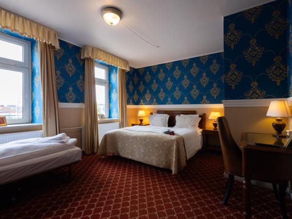 Milling Hotel Plaza : photo 4 de la chambre chambre double ou lits jumeaux avec lit d'appoint