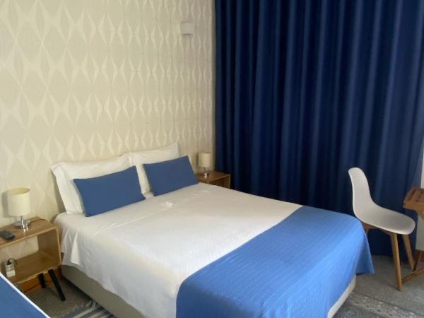Enjoy Viana - Guest House : photo 2 de la chambre chambre triple deluxe
