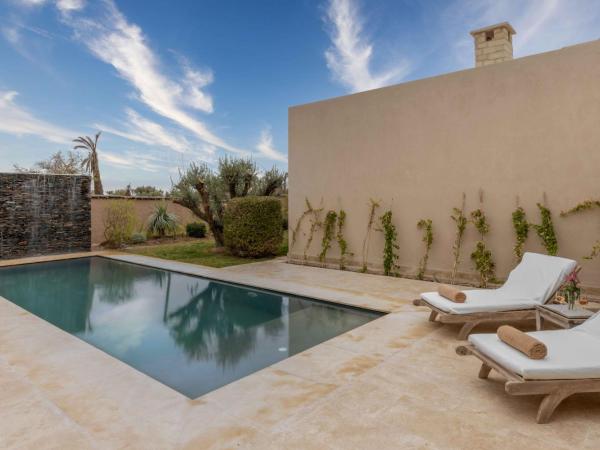 Ksar Char-Bagh Small Luxury Hotels : photo 4 de la chambre suite supérieure lit king-size