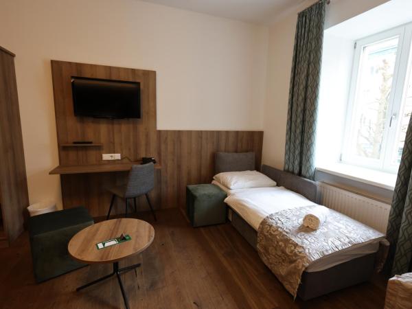 Altstadt Hotel Hofwirt Salzburg : photo 2 de la chambre chambre familiale plus
