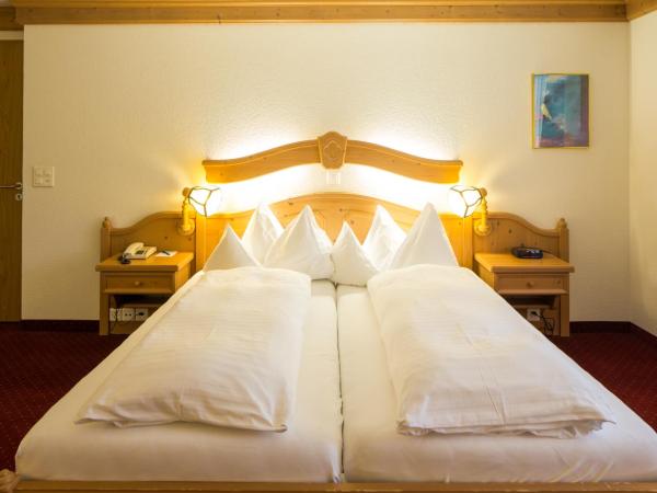 Hotel Grindelwalderhof : photo 2 de la chambre chambre triple