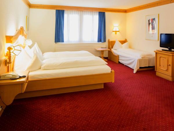 Hotel Grindelwalderhof : photo 1 de la chambre chambre triple
