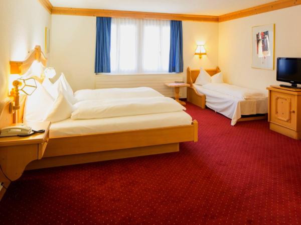 Hotel Grindelwalderhof : photo 1 de la chambre chambre triple