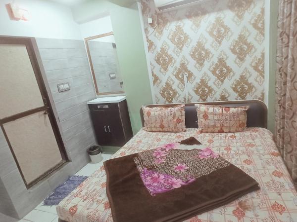 HOTEL KARNAWATI PALACE : photo 1 de la chambre chambre double deluxe