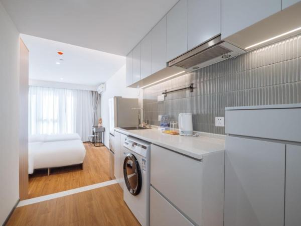 Ketangjian Hotel - Shanghai Railway Station Baoshan Road Subway Station : photo 2 de la chambre chambre lits jumeaux deluxe