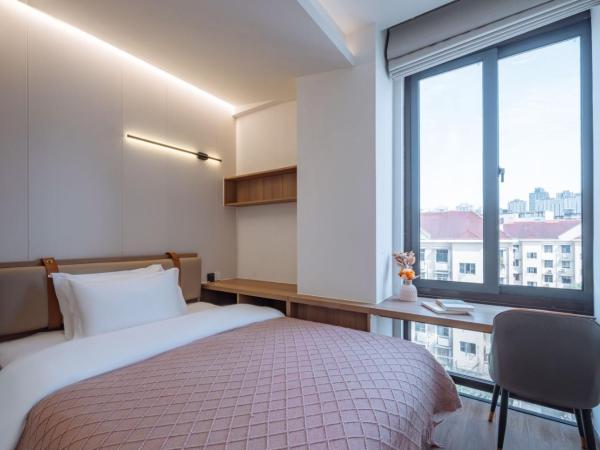 Ketangjian Hotel - Shanghai Railway Station Baoshan Road Subway Station : photo 4 de la chambre chambre standard lit queen-size