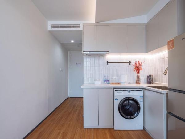 Ketangjian Hotel - Shanghai Railway Station Baoshan Road Subway Station : photo 7 de la chambre chambre standard lit queen-size