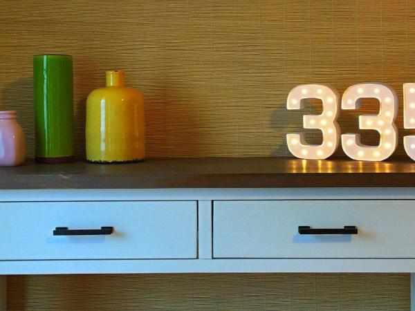 Rotorua Coachman Spa Motel : photo 4 de la chambre appartement confort 4 chambres avec bain à remous