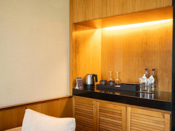 DoubleTree by Hilton-Pune Chinchwad : photo 10 de la chambre suite king exécutive avec accès au salon