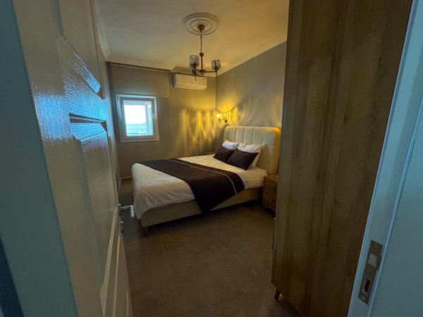 Gümüşlük apart : photo 9 de la chambre appartement - vue sur mer