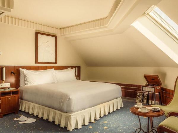 Hôtel Des Grands Voyageurs : photo 1 de la chambre chambre deluxe