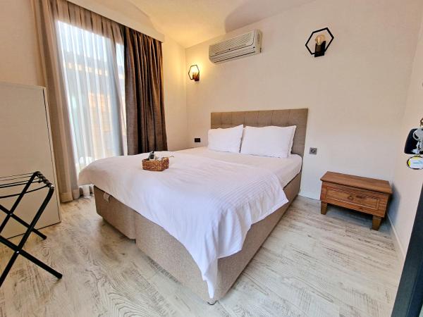 Turnaboğazı Çiftlik Evleri : photo 3 de la chambre suite - vue sur jardin