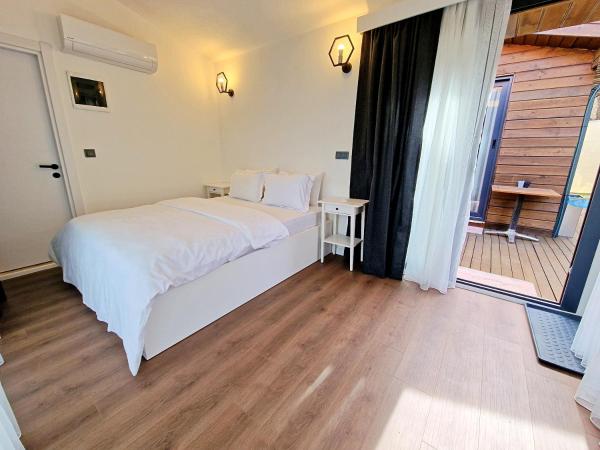 Turnaboğazı Çiftlik Evleri : photo 5 de la chambre suite - vue sur jardin