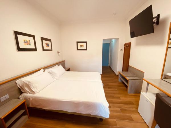 Hotel Garni Montaldi : photo 1 de la chambre chambre lits jumeaux