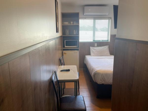 Conway Motel Manukau : photo 1 de la chambre chambre simple avec salle de bains privative