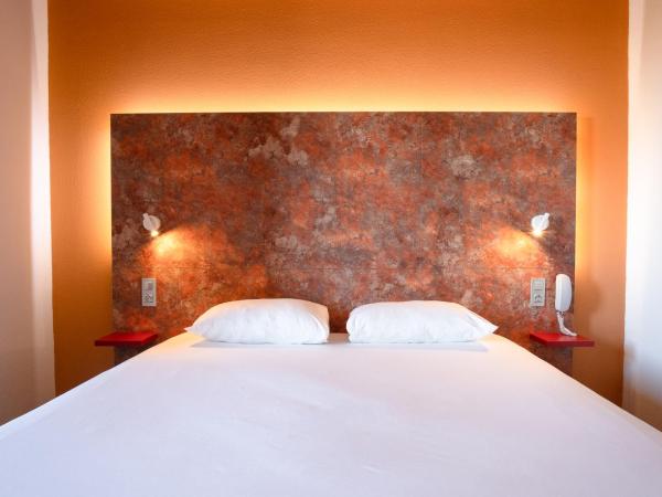 ibis Styles Toulouse Cite Espace : photo 3 de la chambre chambre avec lit double et lits jumeaux
