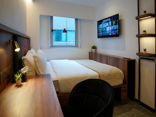 ST Signature Bugis Middle, SHORT OVERNIGHT, 11 hours 8PM-7AM : photo 6 de la chambre deluxe room, window, short overnight, 11hrs:8pm-7am