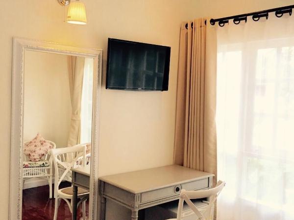 Nai Suan Bed and Breakfast : photo 5 de la chambre suite lit king-size avec balcon