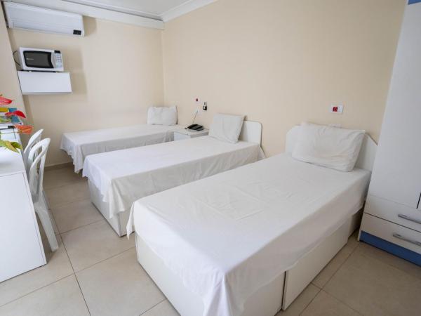 Flat Econômico : photo 2 de la chambre chambre triple supérieure