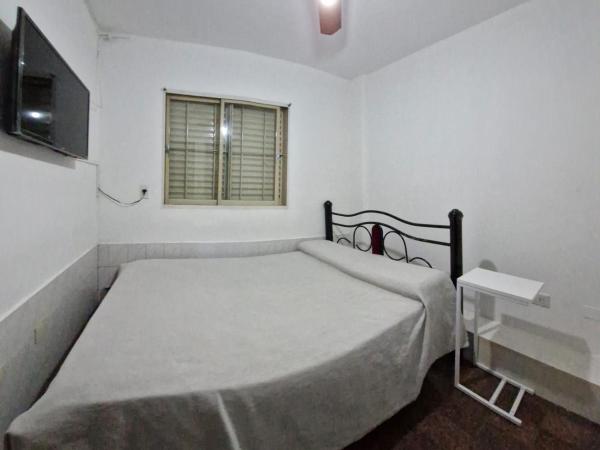 HOTEL RESIDENCIAL CAMACHO : photo 1 de la chambre chambre lit queen-size - vue sur jardin