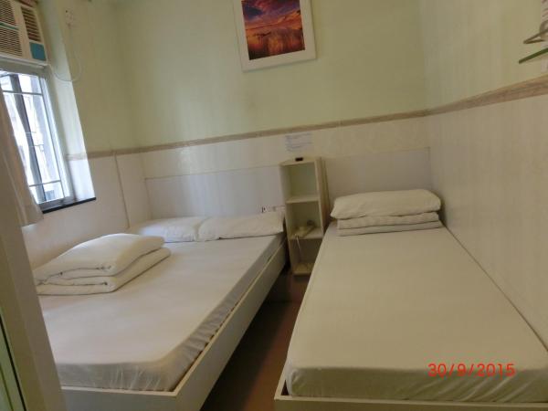 Li Cheng Guesthouse : photo 3 de la chambre chambre triple avec salle de bains privative
