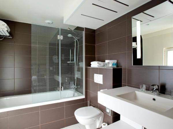 Holiday Inn Paris Opéra - Grands Boulevards, an IHG Hotel : photo 1 de la chambre chambre lit queen-size supérieure avec canapé-lit – non-fumeurs