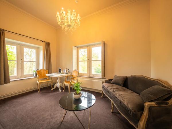 Leyselebeke Castle : photo 2 de la chambre suite - vue sur jardin