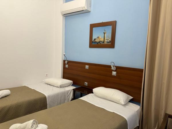 Eleni Rooms : photo 3 de la chambre chambre lits jumeaux