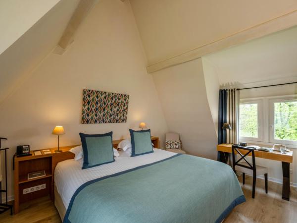 Les Manoirs de Tourgéville : photo 5 de la chambre triplex