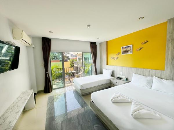 Anantra Pattaya Resort : photo 6 de la chambre chambre lits jumeaux de luxe avec vue sur la piscine